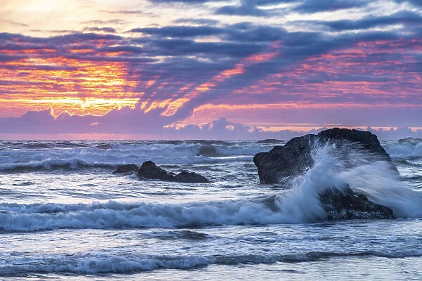 USA, Oregon, Bandon Beach. Pacific Ocean shoreline at sunset