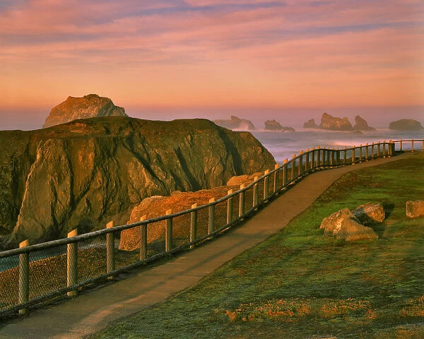 USA, Oregon, Bandon. Rocks viewed from trail in Bandon Ocean State Wayside Park. Credit as