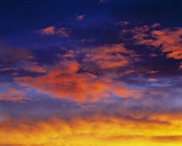 USA, Oregon, Bend. Sunrise colors a cloudy sky in the Bend area, Oregon