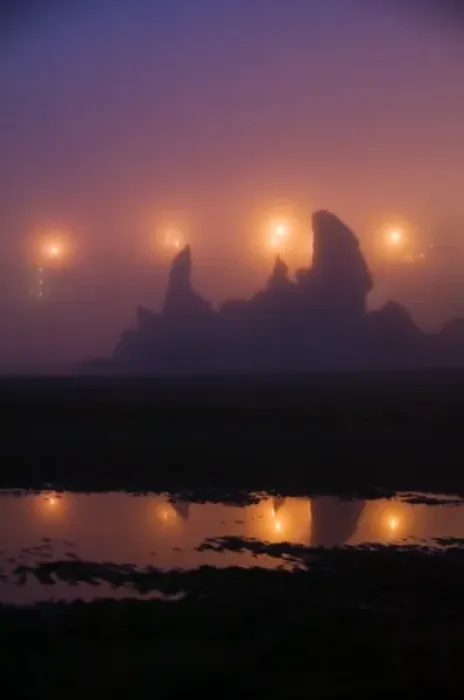 Framed Print : USA, Oregon, Brandon. City night lights silhouette sea stacks in fog at the beach