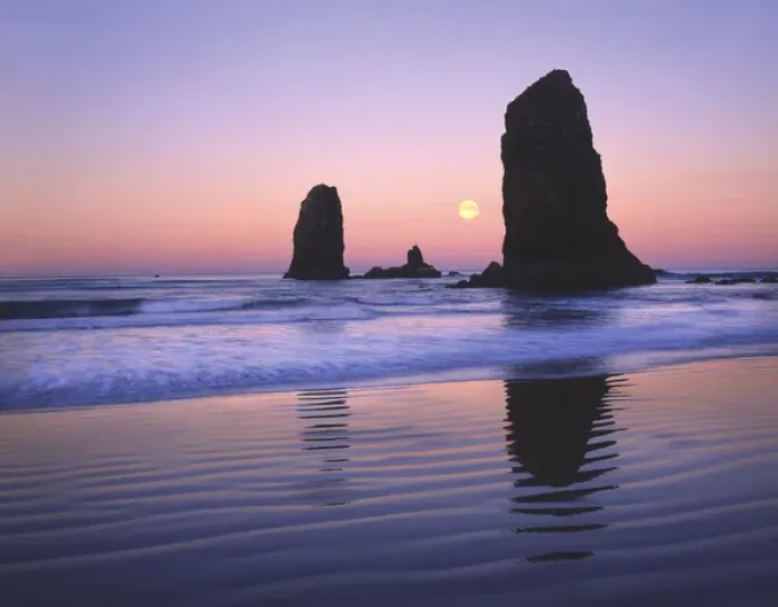 Framed Print : USA, Oregon, Cannon Beach, Moonset between The Needles rocks in early morning light Framed Print : USA, Oregon, Cannon Beach, Moonset between The Needles rocks in early morning light