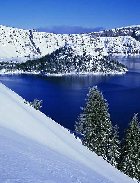 USA, Oregon, Crater Lake National Park. Snow-covered Wizard Island in Crater Lake