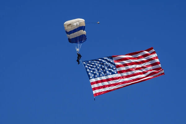 USA, Oregon, Hillsboro, USAF Academy skydiver, diving with the US Flag