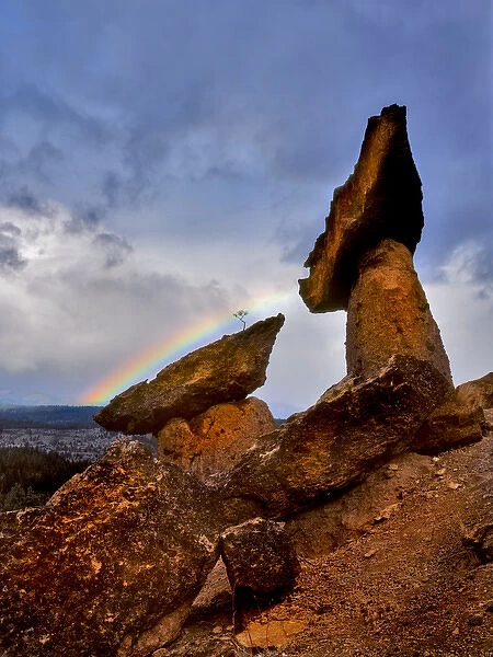 USA, Oregon, Jefferson County. Scenic of two of The Balancing Rocks and a rainbow