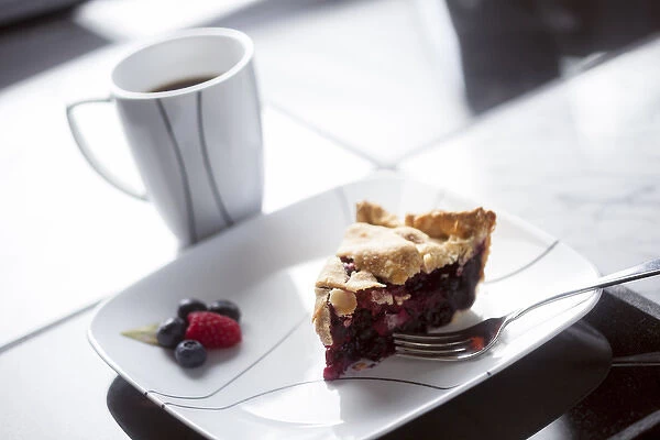 USA, Oregon, Keizer, a piece of raspberry  /  blueberry pie and a cup of coffee