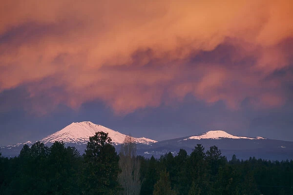 USA, Oregon, Mt Bachelor. Colorful clouds hang above Mt Bachelor near Bend, Oregon