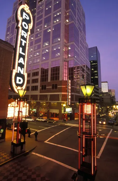 Framed Print : USA, Oregon, Portland, Cars streak by the Arlene Schnitzer Concert Hall and the Fox Tower