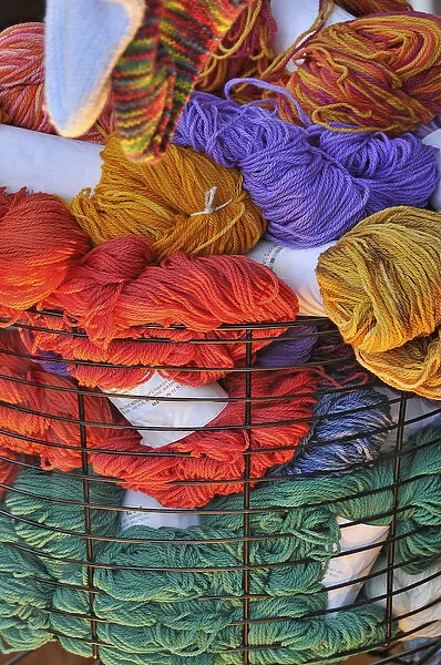 USA, Oregon, Portland. Close-up of basket of yarn bundles