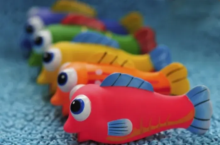 Framed Print : USA, Oregon, Portland. Close-up of colorful fish bathtub toys