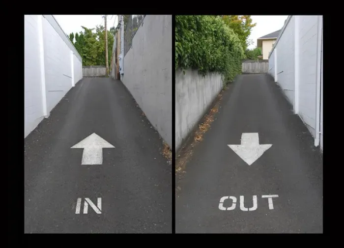 Framed Print : USA, Oregon, Portland. Entrance and exit from alley directed by arrows. Credit as Framed Print : USA, Oregon, Portland. Entrance and exit from alley directed by arrows. Credit as