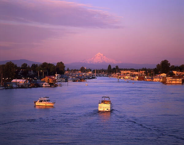 USA, Oregon, Portland. Evening light on boats in the Columbia River Channel with Mt