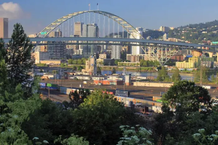 Framed Print : USA, Oregon, Portland. Fremont Bridge over Willamette River and railroad yard. Credit as