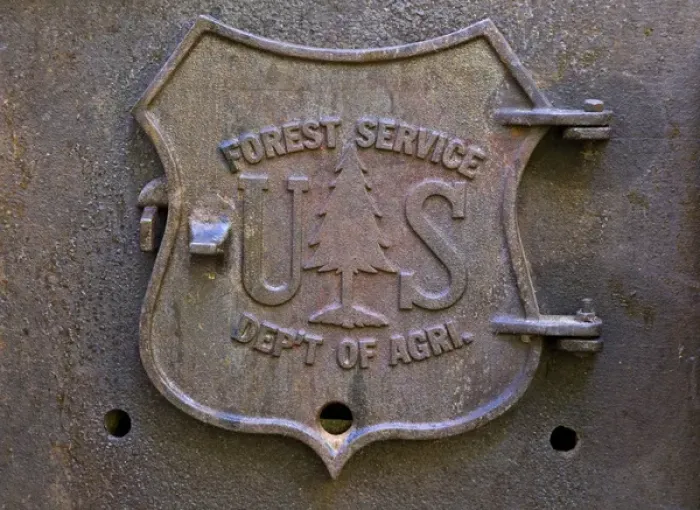 Framed Print : USA, Oregon, Rogue River National Forest. Close-up of US Forest Service plaque on fireplace door Framed Print : USA, Oregon, Rogue River National Forest. Close-up of US Forest Service plaque on fireplace door