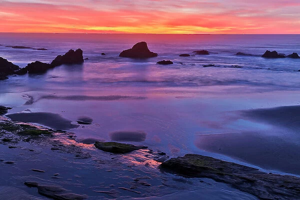 USA, Oregon. Seal Rock State Recreation Site sunset at low tide