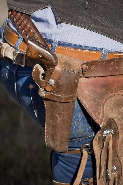 USA, Oregon, Seneca, Ponderosa Ranch. Detail of cowboy holster with pistol