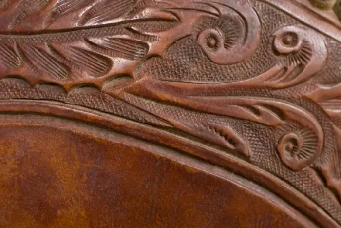 Framed Print : USA, Oregon, Seneca, Ponderosa Ranch. Tooled leather details on a saddle Framed Print : USA, Oregon, Seneca, Ponderosa Ranch. Tooled leather details on a saddle