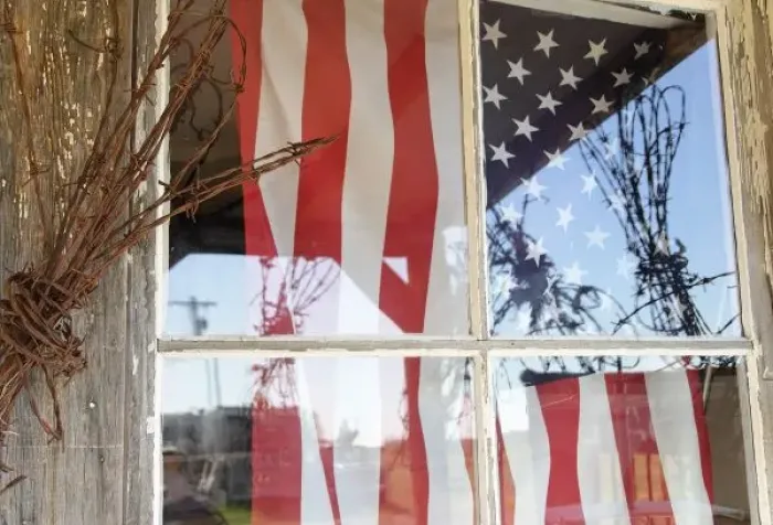 Framed Print : USA, Oregon, Shaniko. Flag in window next to coil of barbed wire. Credit as: Nancy Framed Print : USA, Oregon, Shaniko. Flag in window next to coil of barbed wire. Credit as: Nancy