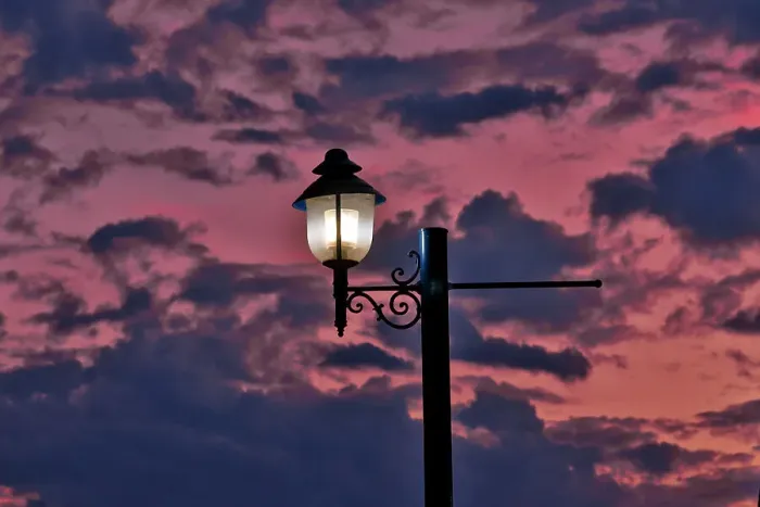 Framed Print : USA, Oregon, Tualatin. Sunset and lights on Lamp post Framed Print : USA, Oregon, Tualatin. Sunset and lights on Lamp post