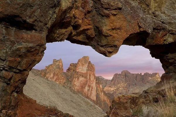 USA, Oregon. View of Leslie Gulch through rock opening