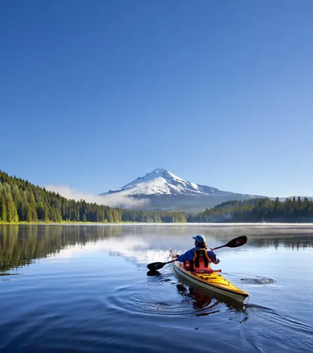 Framed Print : USA, Oregon. A woman in a sea kayak paddles on Trillium Lake, Oregon, in the Oregon Cascades Framed Print : USA, Oregon. A woman in a sea kayak paddles on Trillium Lake, Oregon, in the Oregon Cascades