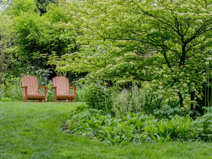 Framed Print : USA, Pennsylvania. A pair of Adirondack chairs in a garden