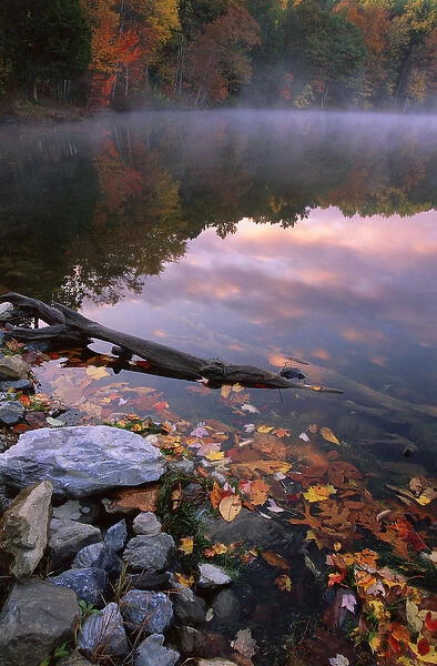 USA, Pennsylvania, Pocono Mountains. Autumn sunrise on lake