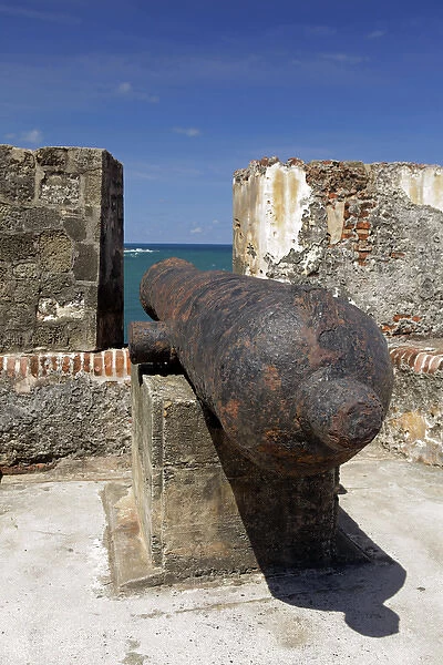 USA, Puerto Rico, San Juan. Cannon at the El Moro Fortress, a UNESCO World Heritage Site