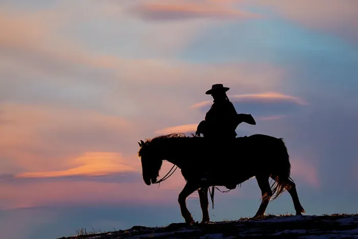 Framed Print : USA, Shell, Wyoming. Hideout Ranch cowgirl silhouetted on horseback at sunset. (PR, MR) Framed Print : USA, Shell, Wyoming. Hideout Ranch cowgirl silhouetted on horseback at sunset. (PR, MR)