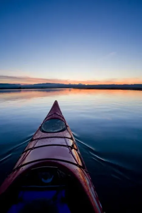 Framed Print : USA, Skagit bay, Washington. Sunrise and kayak floating at sunrise into Skagit Bay, WA