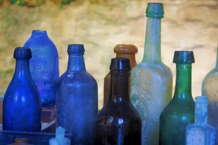 Framed Print : USA, South Carolina, Charleston. Old bottles excavated from slave quarters. Credit as Framed Print : USA, South Carolina, Charleston. Old bottles excavated from slave quarters. Credit as