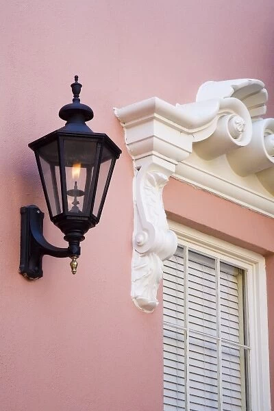 USA, South Carolina, Charleston. Pink house with lantern