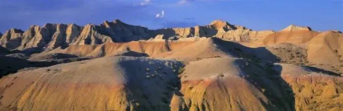 Framed Print : USA, South Dakota, Badlands NP. Sunset deepens dramatic shadows in Badlands National Park Framed Print : USA, South Dakota, Badlands NP. Sunset deepens dramatic shadows in Badlands National Park