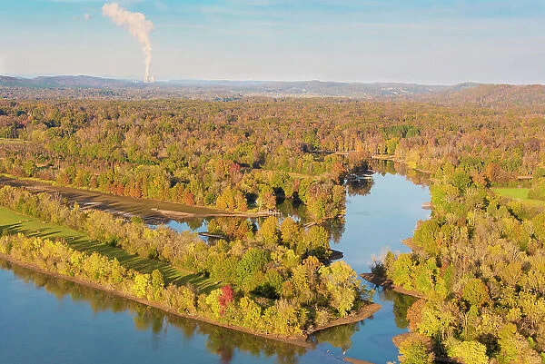 USA, Tennessee. Fall color Tennessee River, Steam from Watts Bar nuclear plant rises on horizon