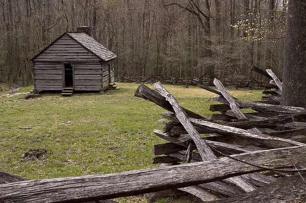USA, Tennessee, Great Smoky Mountains National Park. Abandoned cabin and old wooden rail fence