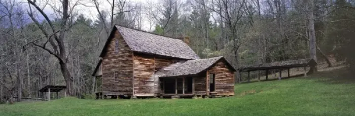 Framed Print : USA, Tennessee, Great Smoky Mts NP. A wooden house sits nestled in the green of Cades Cove