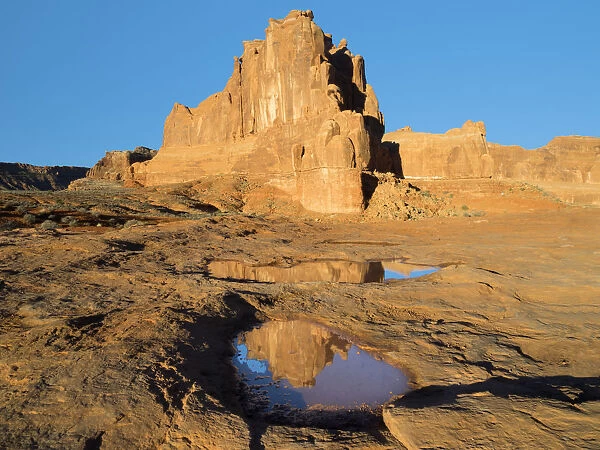USA, Utah. Arches National Park, Courthouse Towers and reflection