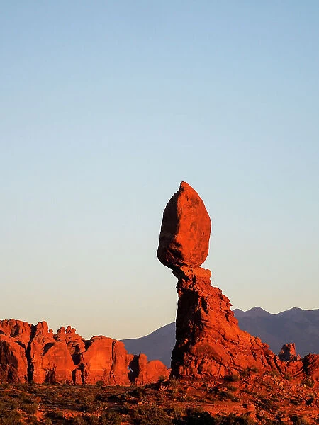 USA, Utah, Arches National Park. Balance Rock at sunset