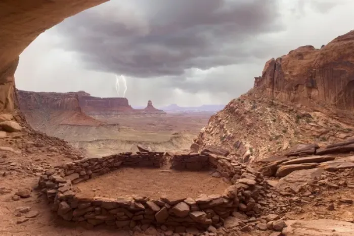 Framed Print : USA, Utah, Canyonlands National Park. View of Anasazi ruin with thundercloud