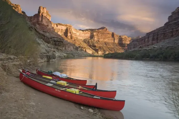 Framed Print : USA, Utah, Canyonlands National Park. Three red canoes rest on bank of Green River Framed Print : USA, Utah, Canyonlands National Park. Three red canoes rest on bank of Green River