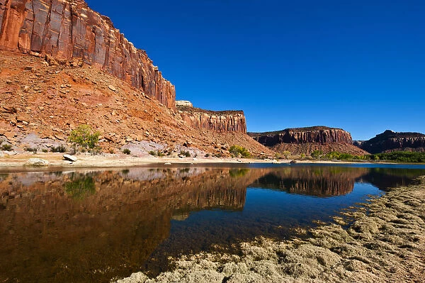 USA, Utah. Canyonlands National Park. Reflection in Dugout Reservoir, Needles area
