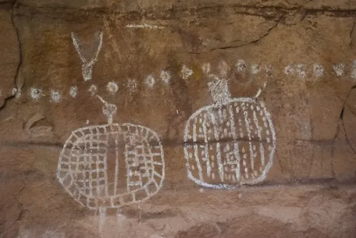 Framed Print : USA, Utah, Canyonlands NP. Ancestral Pueblo pictographs near Peekaboo Spring; Needles District