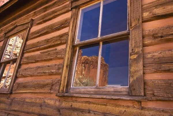 USA, Utah, Capitol Reef National Park. Reflection of nearby cliffs in the window
