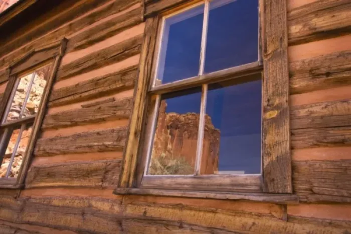 Framed Print : USA, Utah, Capitol Reef National Park. Reflection of nearby cliffs in the window