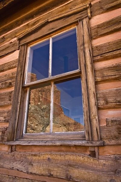 USA, Utah, Capitol Reef National Park. Reflection of nearby cliffs in the window