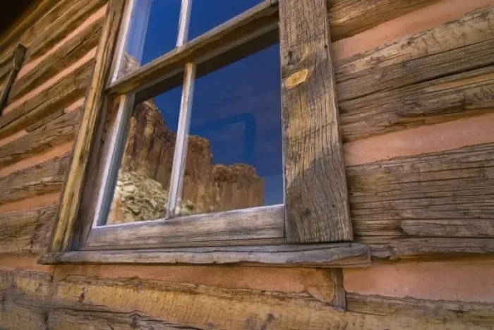 Framed Print : USA, Utah, Capitol Reef National Park. Reflection of nearby cliffs in the window