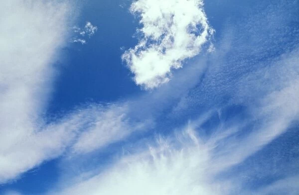 USA, Utah. Cumulus, cirrus fibratus, and cirrocumulus clouds