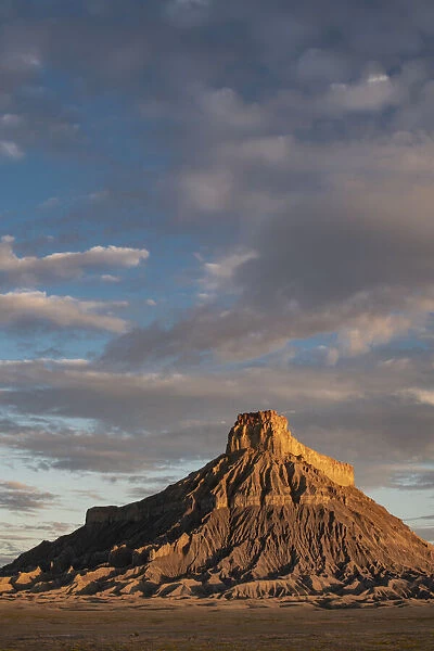 USA, Utah. Early morning clouds at Factory Butte, Upper Blue Hills