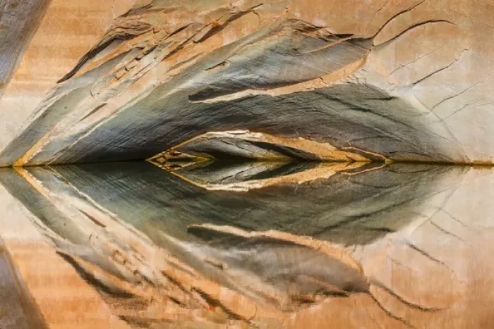 Framed Print : USA, Utah, Glen Canyon National Recreation Area. Abstract reflection of stained sandstone wall