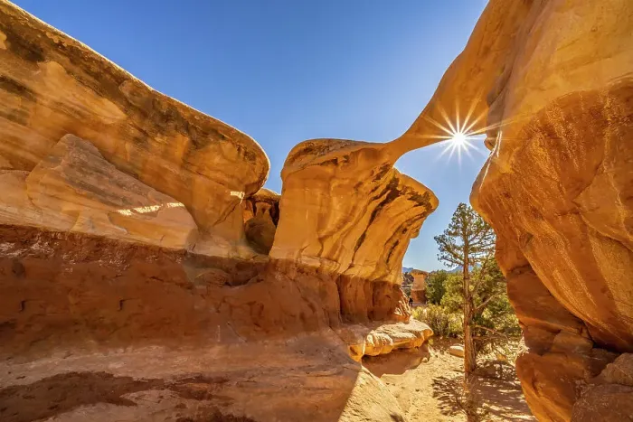 Framed Print : USA, Utah, Grand Staircase Escalante National Monument. Sunburst on eroded rock formations in Devil's Garden