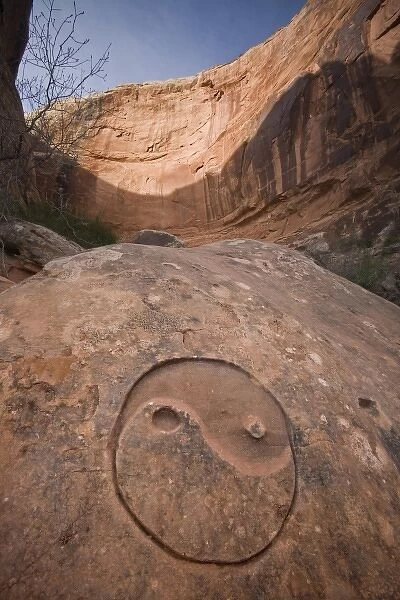 USA, Utah, Horseshoe Canyon. The Chinese Yin-Yang symbol carved in stone